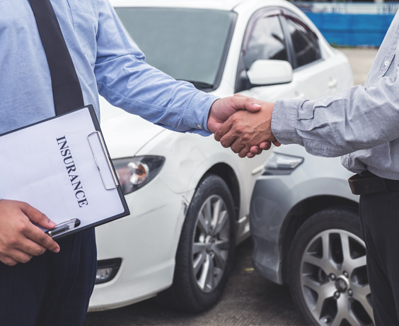 two man shaking hands for car insurance