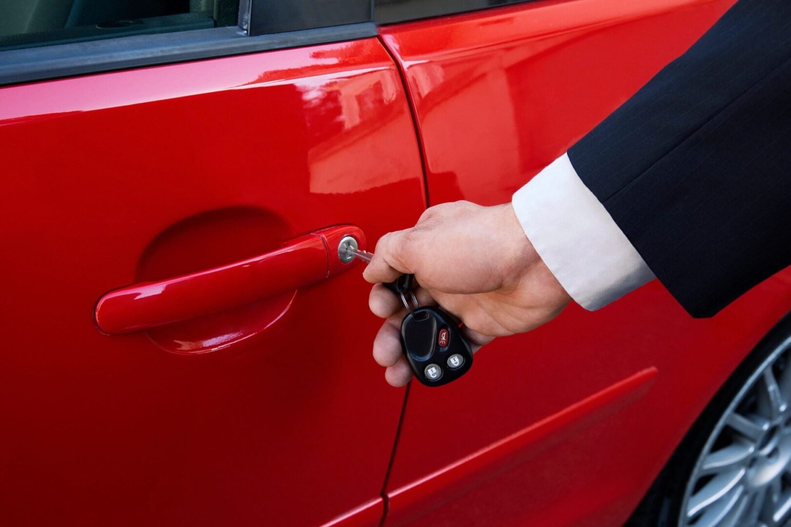 man with car keys